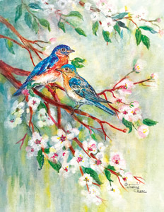 Two bluebirds on a blossoming tree branch